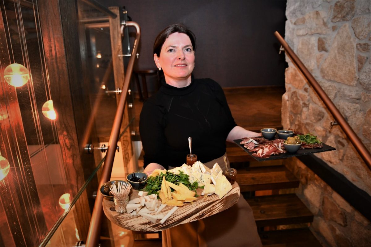 Santina Kennedy of Powerscourt Distillery with food on stairs (2)
