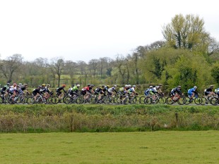PR agency MGMPR - 3 May 2015; A general view of the action as the peloton approach Killylea, Co. Armagh, during the third stage. 150 elite cyclists from Australia, Holland, Belgium, France, England, Scotland, Northern Ireland and the Republic of Ireland compete in Stage 3 of the AmberGreen Energy Tour of Ulster in partnership with the SDS Group and Saltmarine Cars. Stage 3 takes the cyclists from Newry - Camlough - Newtownhamilton - Keady - Markethill - Hamiltonsbawn - Richill - Armagh - Caledon - Aughnacloy - Ballygawley (Whitebridge Road) - Pomeroy - Donaghmore - Cookstown. Picture credit: Stephen McMahon / SPORTSFILE