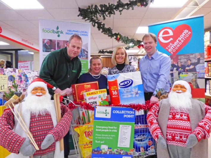 From left, Gavin Emerson, Marissa Quinn and Alessie Magowan from The Emerson's Foundation with Richard Thompson from the Armagh Foodbank launching the Christmas Trolley Appeal P1030943A